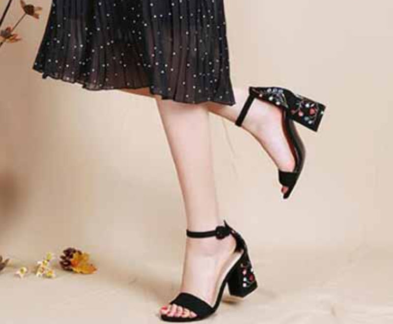 Bohemia sandals with embroidered heels.