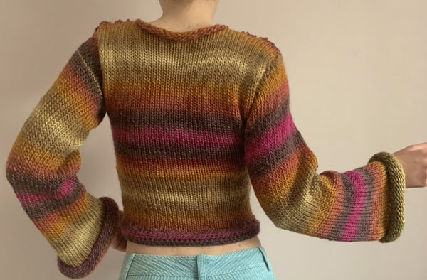 Multicolored 70s patchwork knit sweater.