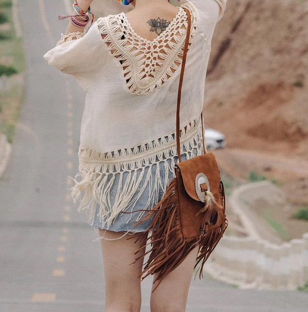 Shoulder bag with hippie fringes.