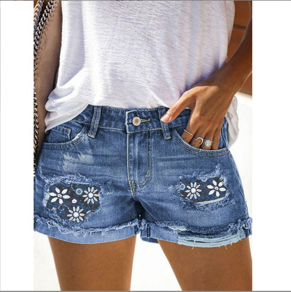 Daisy patchwork bohemian denim shorts.