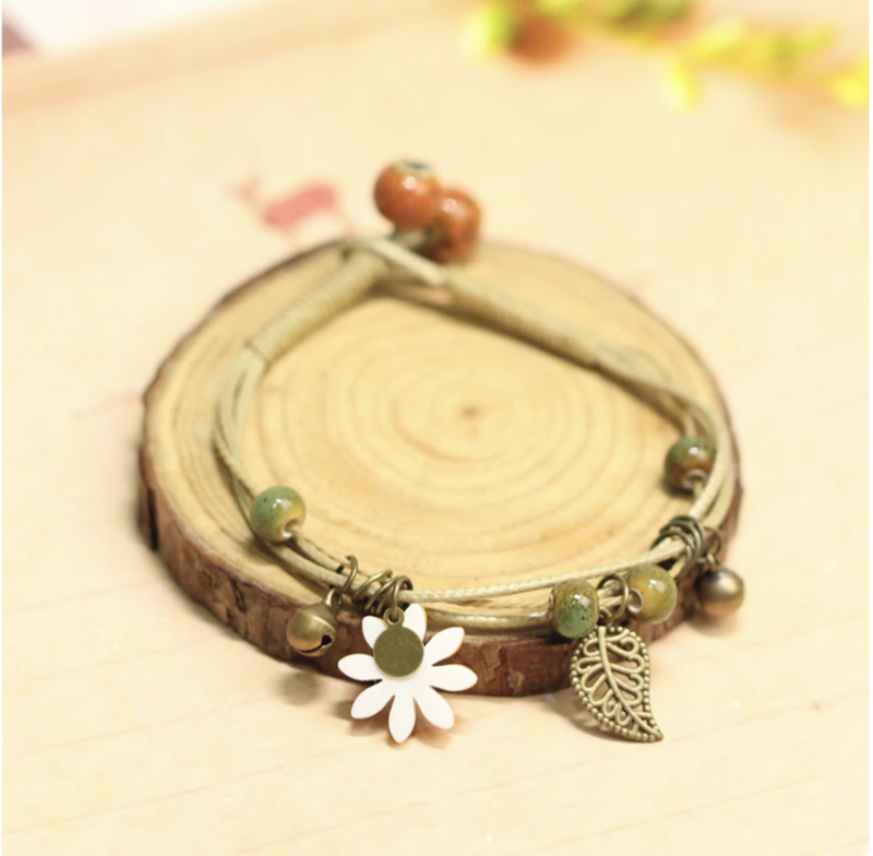 Romantic bohemian ceramic and copper cord bracelet flower leaf.