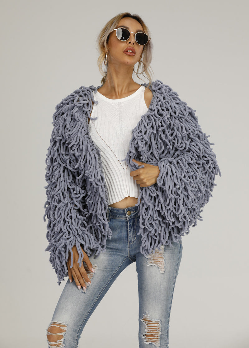 Woolen fringed hippie jacket.