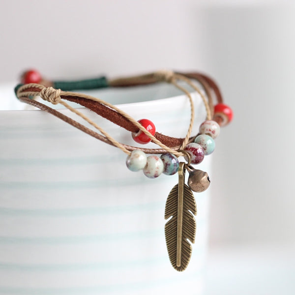 Romantic bohemian porcelain and copper cord bracelet flower leaf.